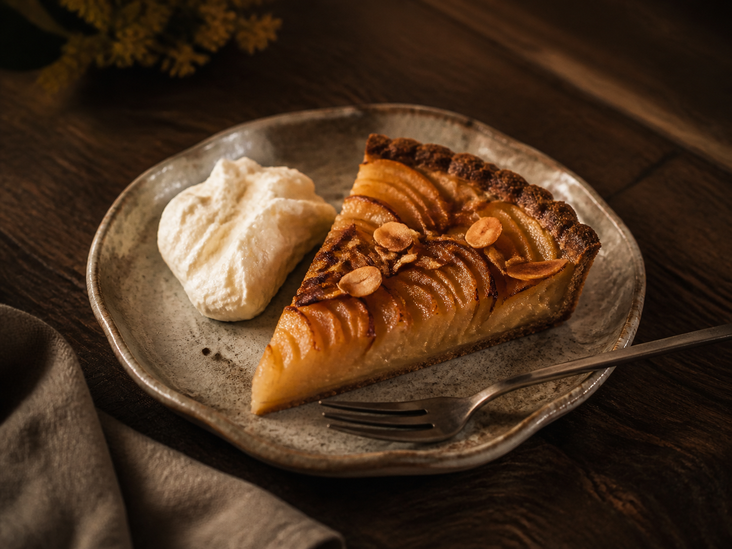 Pear and almond tart with whipped cream